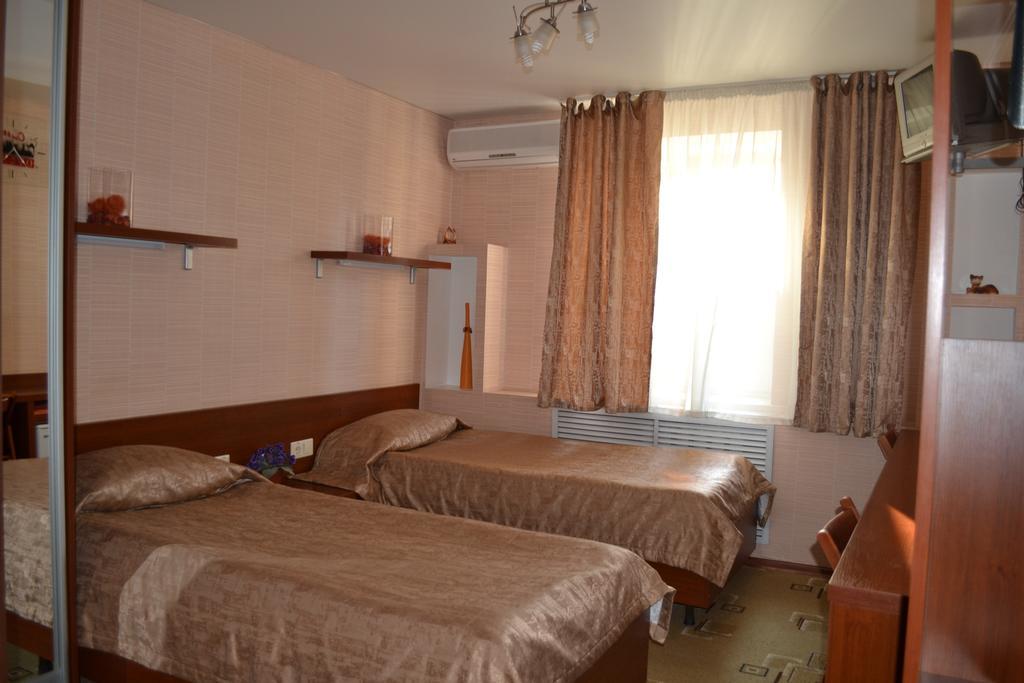 City Hotel Homel Szoba fotó