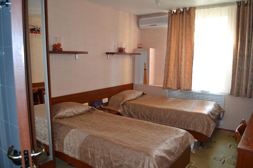 City Hotel Homel Szoba fotó