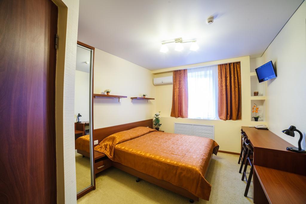 City Hotel Homel Szoba fotó